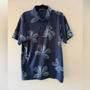 Travis Mathew Dark Blue Golf Polo with Floral Pattern